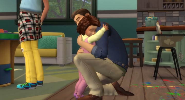The Sims 4 Parenthood Game Pack: A daddy hugs his daughter in the DLC