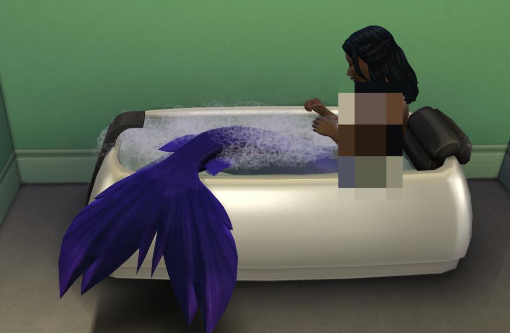 A Mermaid bathes in The Sims 4 Island Living Expansion Pack. This replenishes their Hydration.